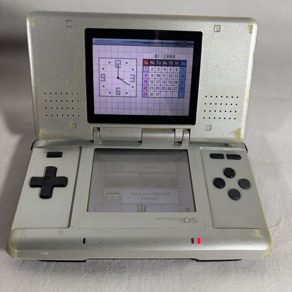 Nintendo DS Original Silver NTR-001 Powers On For Parts/ Repair